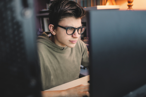 student boy focusing