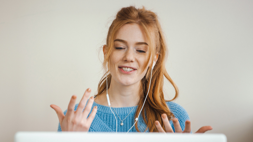 woman home using laptop working from home concept beautiful ginger woman with freckles